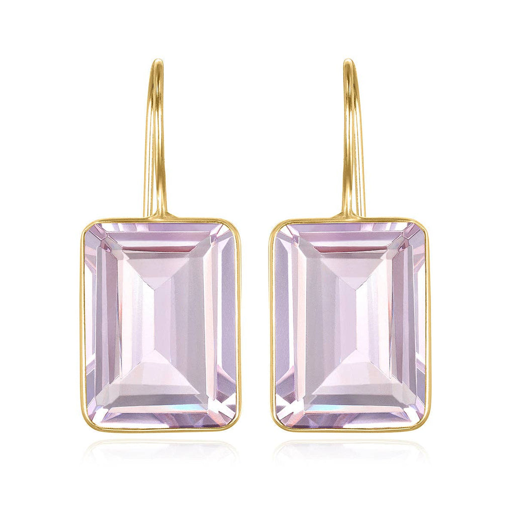 Gold earrings with square purple gemstones on a white background