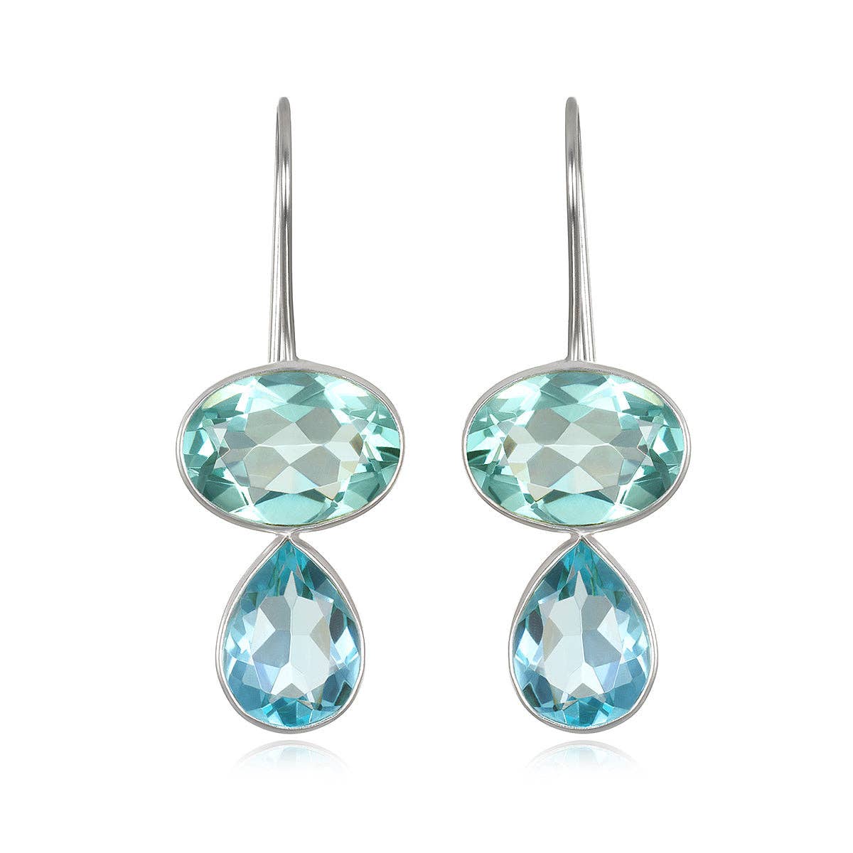 Pair of earrings with blue gemstones on a white background